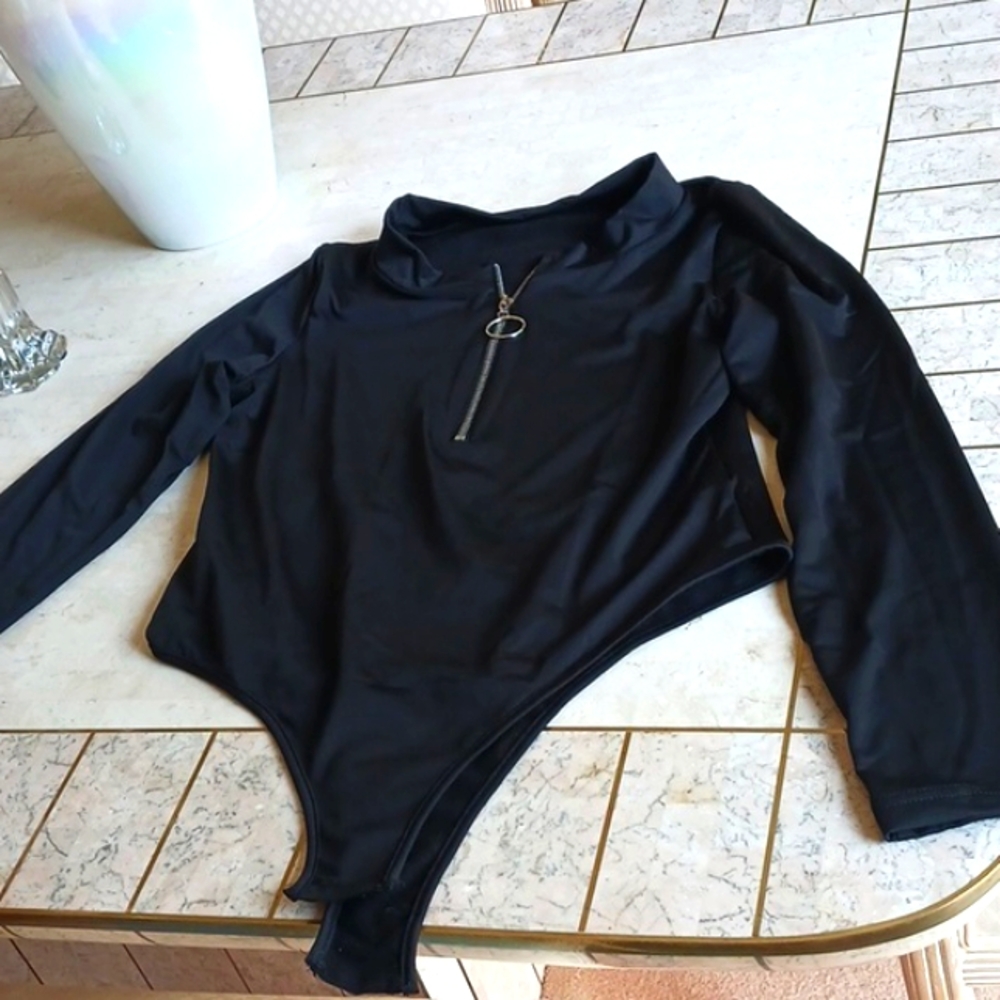 Women's bodysuit,sz XL..black, snap bottom.silver pull zip front..New